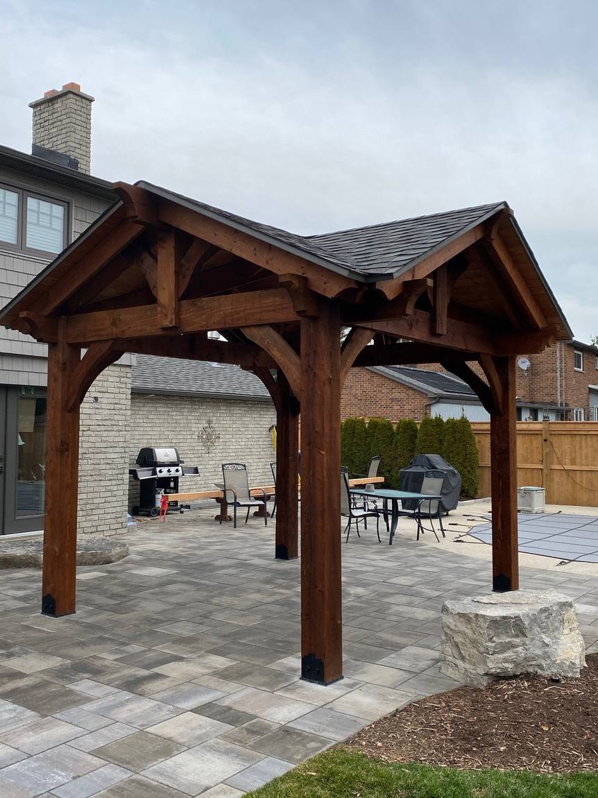 Timber pergola over an interlock patio