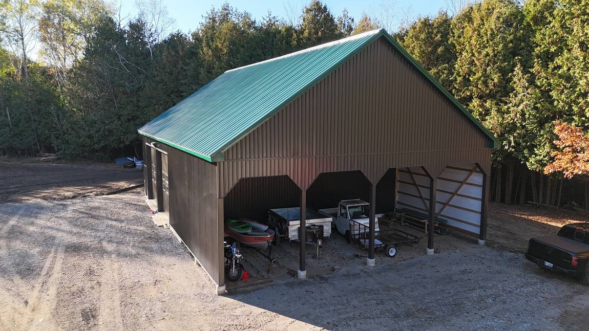 Detached garage and open bays