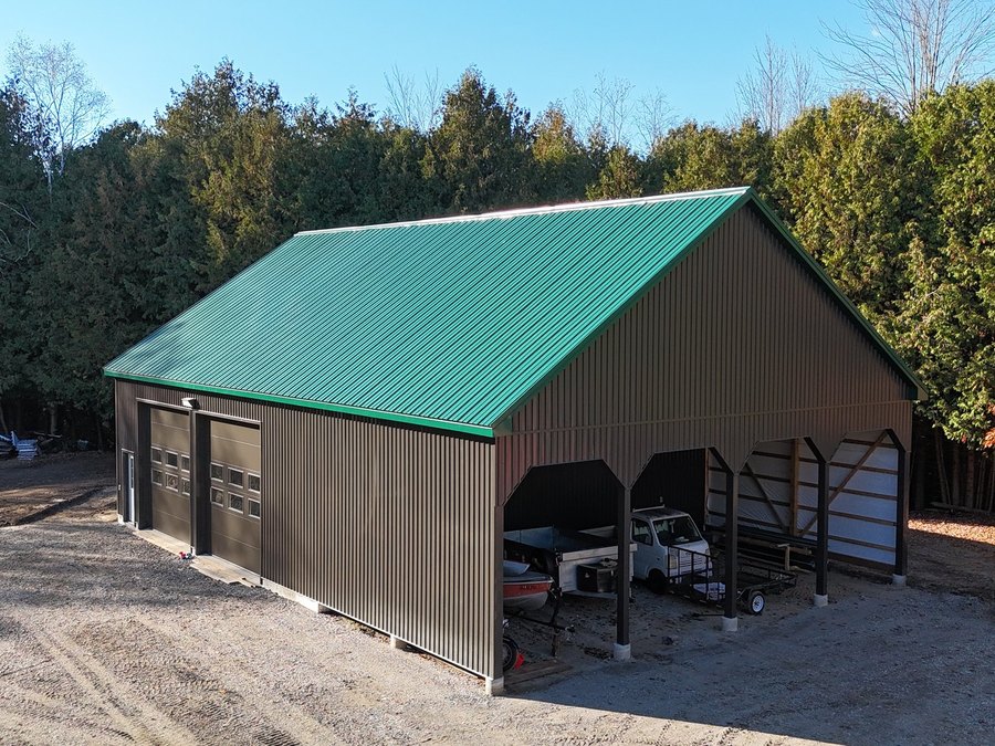 Detached shop with steel roof and open bays