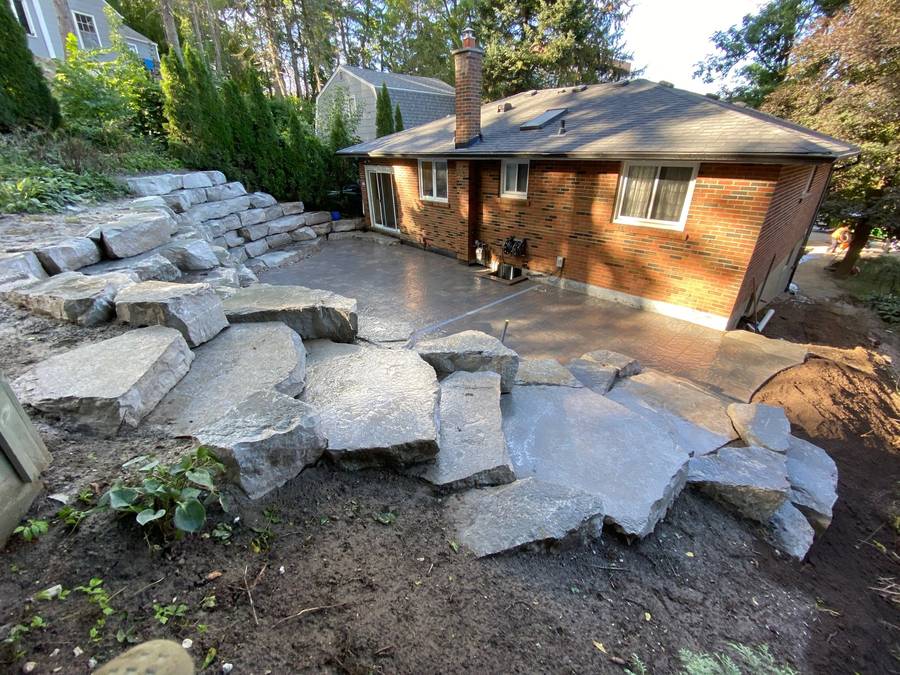 Armour stone and concrete patio under construction