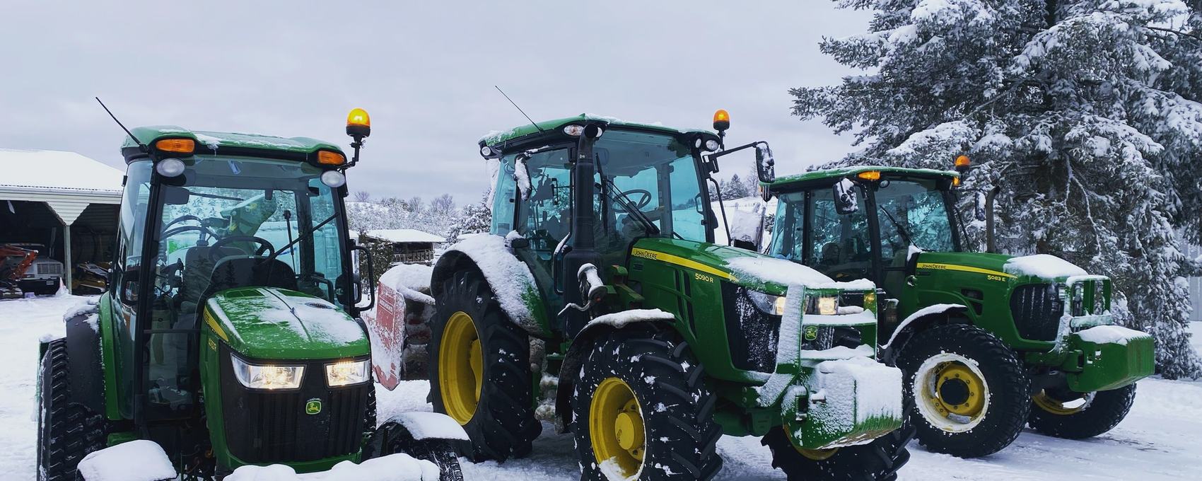 River Ridge tractors fitted with snow blowers, ready for the season